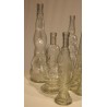 Set of 7 Italian glass bottles