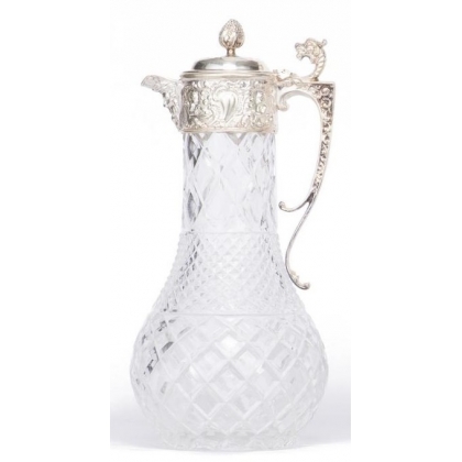 Crystal carafe with a silver-coloured metal spout