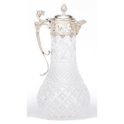 Crystal carafe with a silver-coloured metal spout