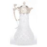 Crystal carafe with a silver-coloured metal spout