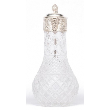 Crystal carafe with a silver-coloured metal spout