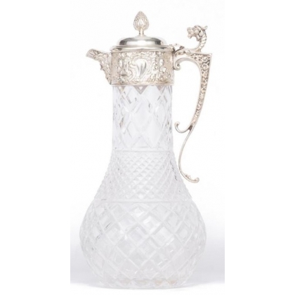 Crystal carafe with a silver-coloured metal spout