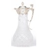 Crystal carafe with a silver-coloured metal spout
