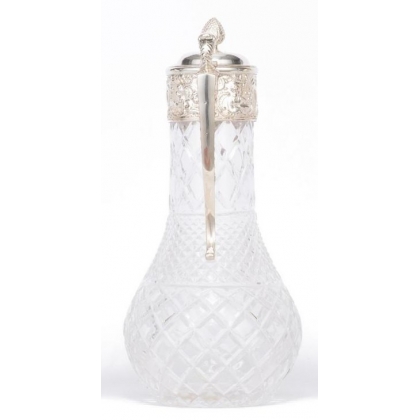 Crystal carafe with a silver-coloured metal spout