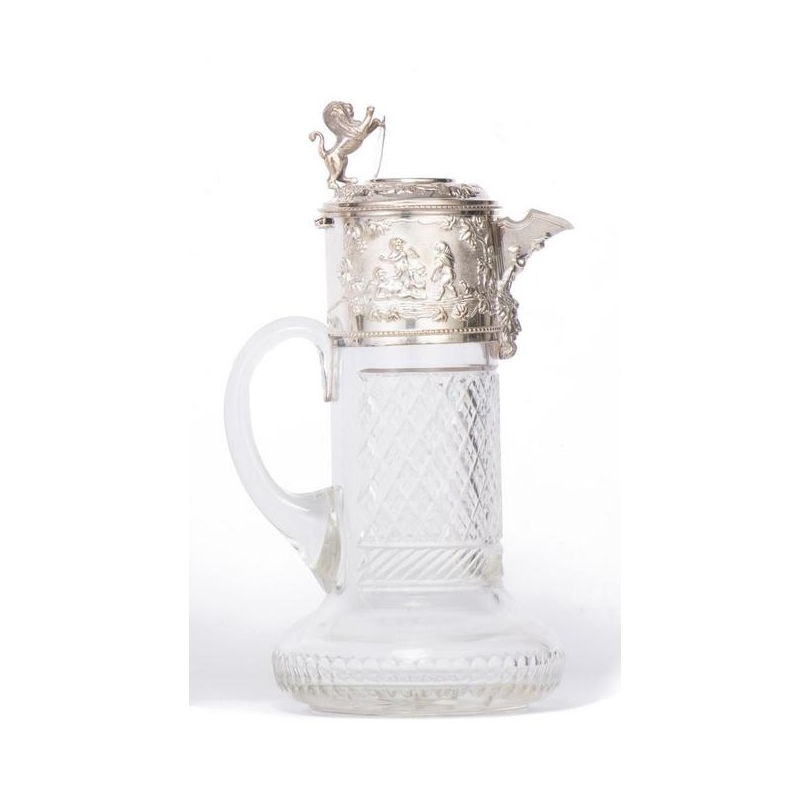 Crystal carafe with a silver-coloured metal spout