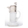 Crystal carafe with a silver-coloured metal spout