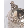 Crystal carafe with a silver-coloured metal spout
