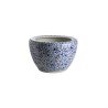 Blue and white plant pot with a floral design