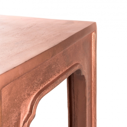 Cast aluminium stool in red copper colour