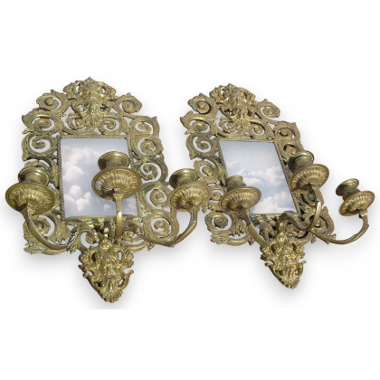Pair of mirrored wall lights. From  Moinat SA  - Antiques and home décor