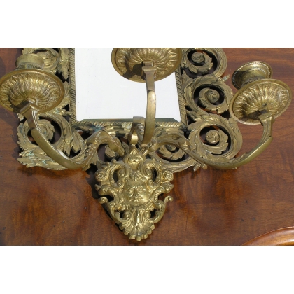 Pair of mirrored wall lights. From  Moinat SA  - Antiques and home décor