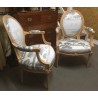 A pair of Louis XVI armchairs with medallion-shaped backs. On  Moinat SA  - Antiques and interior design