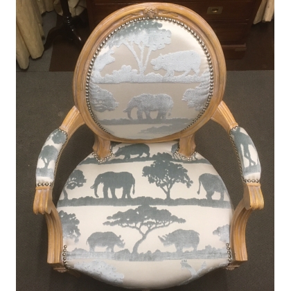 A pair of Louis XVI armchairs with medallion-shaped backs. On  Moinat SA  - Antiques and interior design