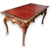 Napoleon III-style flat-topped desk with a red leather top
