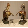 Paire de chevaux en bois sculpté polychrome