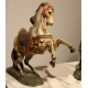 Paire de chevaux en bois sculpté polychrome