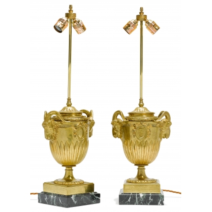 Pair of Urnes lamps with ram’s heads