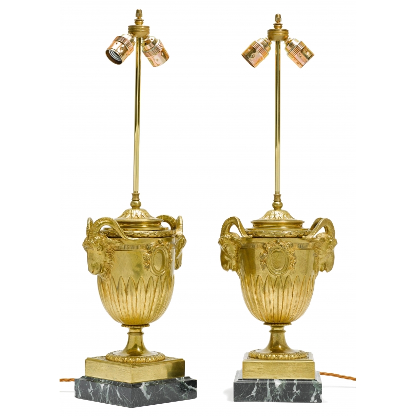 Pair of Urnes lamps with ram’s heads