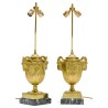 Pair of Urnes lamps with ram’s heads