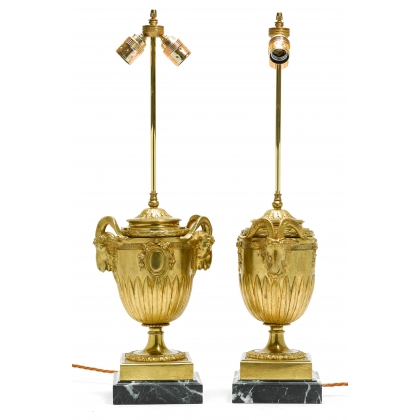 Pair of Urnes lamps with ram’s heads