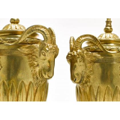 Pair of Urnes lamps with ram’s heads