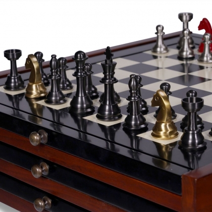 Polished metal chess pieces