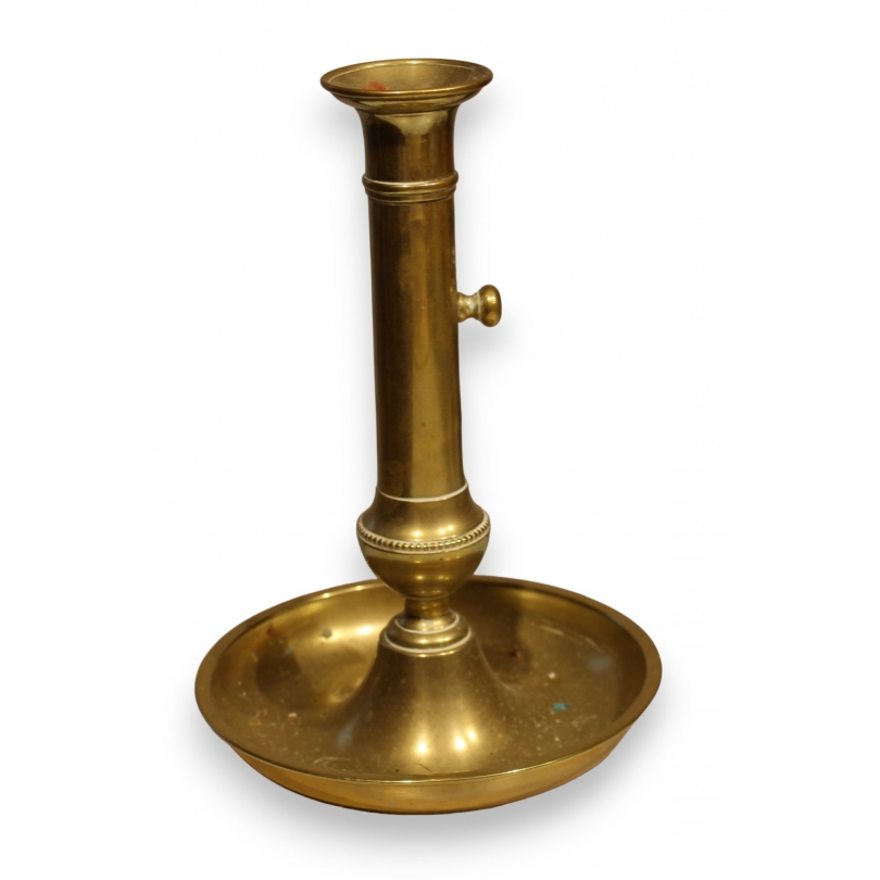 Adjustable brass bowl-shaped candle holder