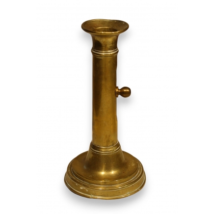 Adjustable brass candle holder