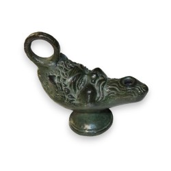 Lampe à huile \"Tête grotesque\" en bronze