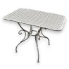  Table en fer forgé rectangulaire, plateau perforé sur  Moinat SA  - Antiquités décoration