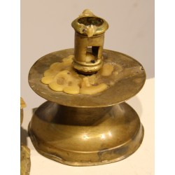 A pair of bronze candlesticks