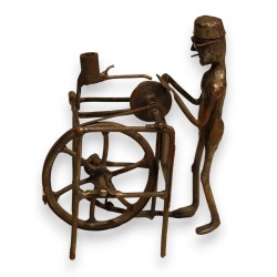 Sculpture filiforme \"Le Remouleur\" en fer