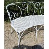 White MALMAISON curved wrought-iron sofa at Moinat SA – Antiques and home décor