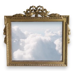 Miroir style Louis XVI fronton noeud en bois doré