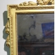 Miroir style Louis XVI fronton noeud en bois doré