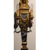 A pair of wall lights made of painted and gilded wood