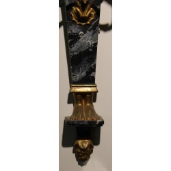 A pair of wall lights made of painted and gilded wood