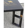 Black coffee table. Available from  Moinat SA  - Antiques and home décor