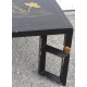 Table basse noire motifs papillons et de canards