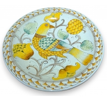Plat rond en faïence Oiseau jaune signé INNOCENTI