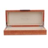 Orange and gold crocodile-effect box