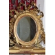 Louis XVI mirror with a small