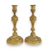 A pair of Louis XVI-style candlesticks