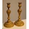 A pair of Louis XVI-style candlesticks