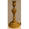 A pair of Louis XVI-style candlesticks