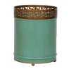 Round wastepaper basket made of blue-painted sheet metal