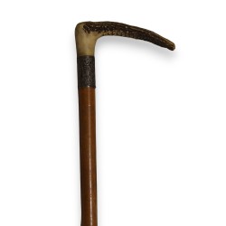 Whip with a deer antler handle