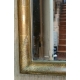Miroir Louis XVI à décor de cassolette.