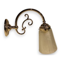 Chrome-plated iron wall light with a moulded glass globe