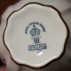 Service en porcelaine Paquerettes bordure dorée